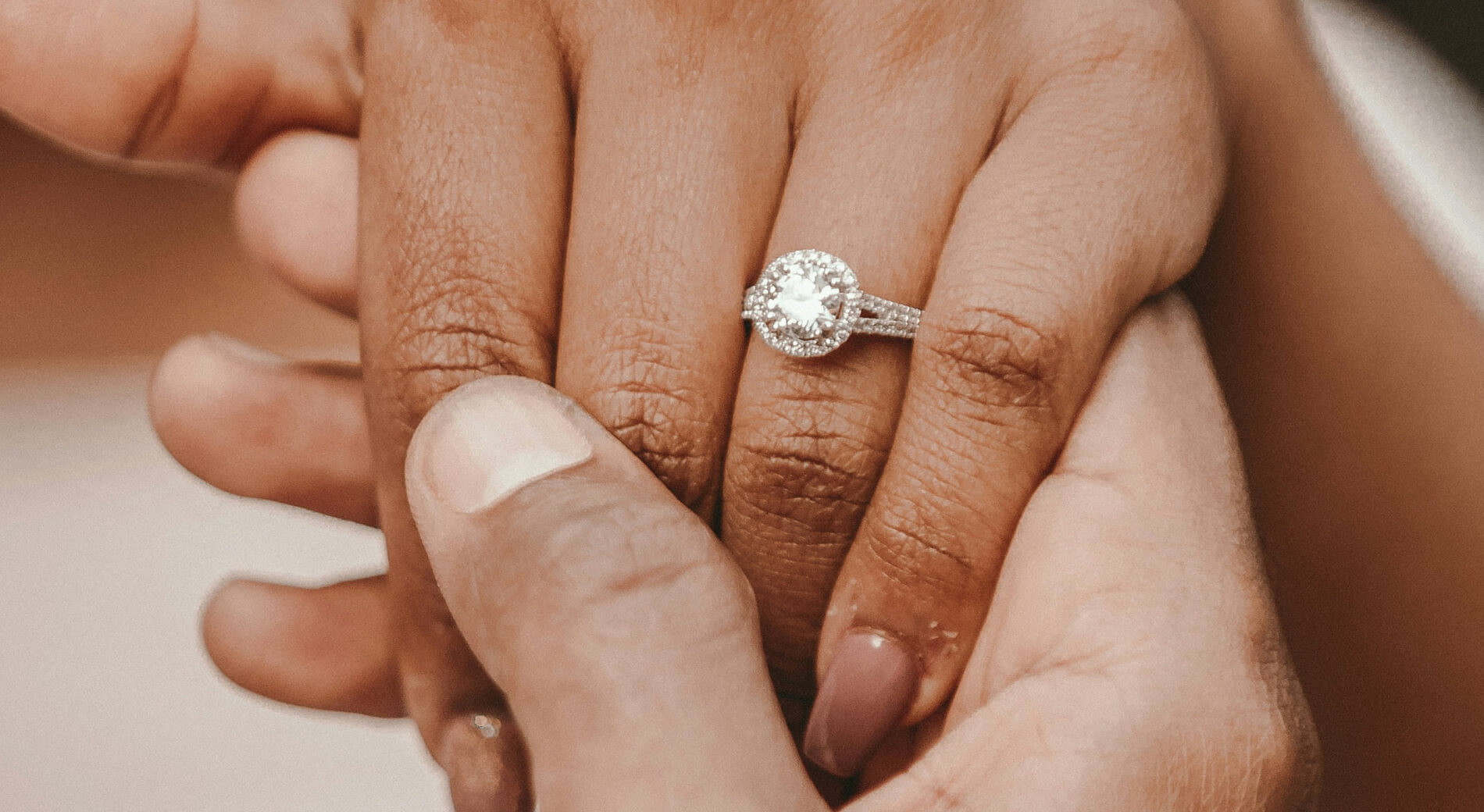 An engagement ring has long symbolized